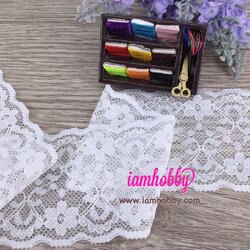 ลูกไม้ยืดตาข่ายสีขาวลายดอกไม้ 5.5 cm.- 6.5 cm. ( 1 หลา ) เลือกลาย