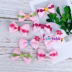 โบว์ผ้าแฮนด์เมดสีชมพูหวานๆ แต่งลูกไม้ (แพ็คละ 16 ชิ้น)