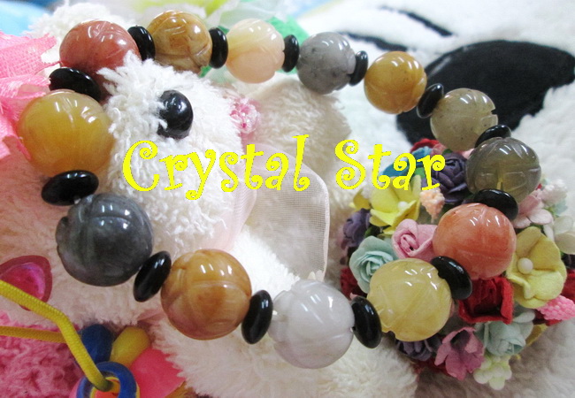 สร้อยข้อมือหยกกลมแกะสลักรูปดอกไม้