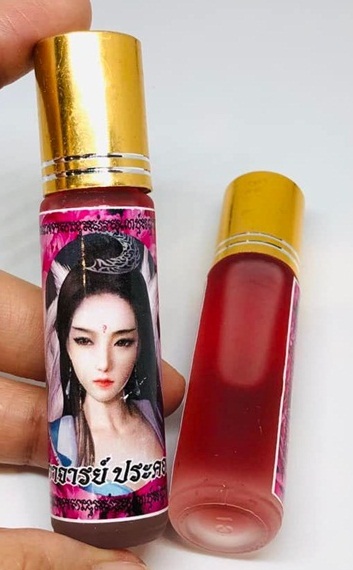 อาจารย์ประคอง น้ำมันจิ้งจอกเก้าหาง มหาเสน่ห์ รุ่น เจริญ KM098