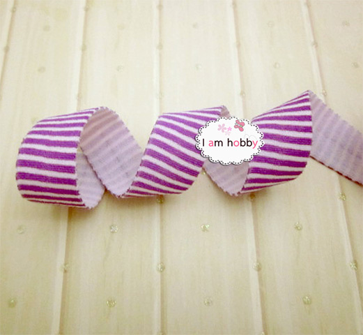 ริบบิ้นยืดลายสีม่วง ขนาด 16 มิล (2 หลา)