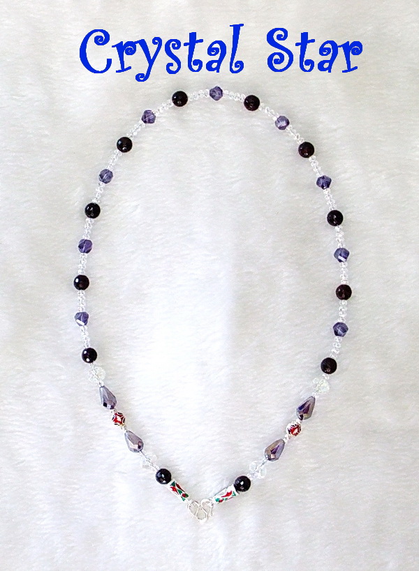 สร้อยคอโกเมนและคริสตัล