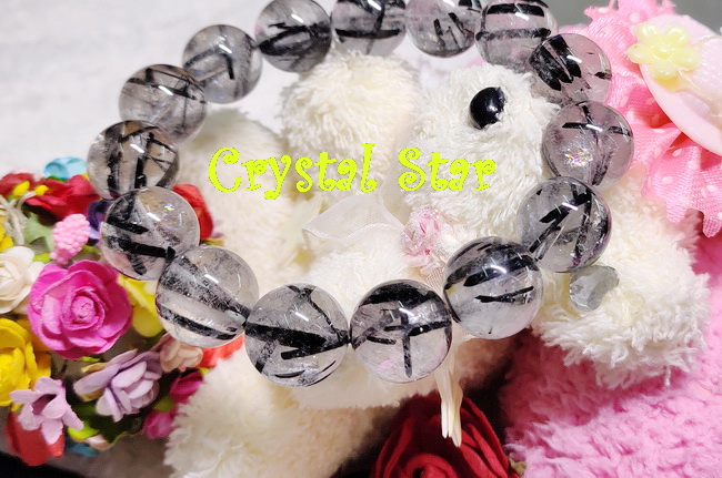 สร้อยข้อมือแก้วขนเหล็ก