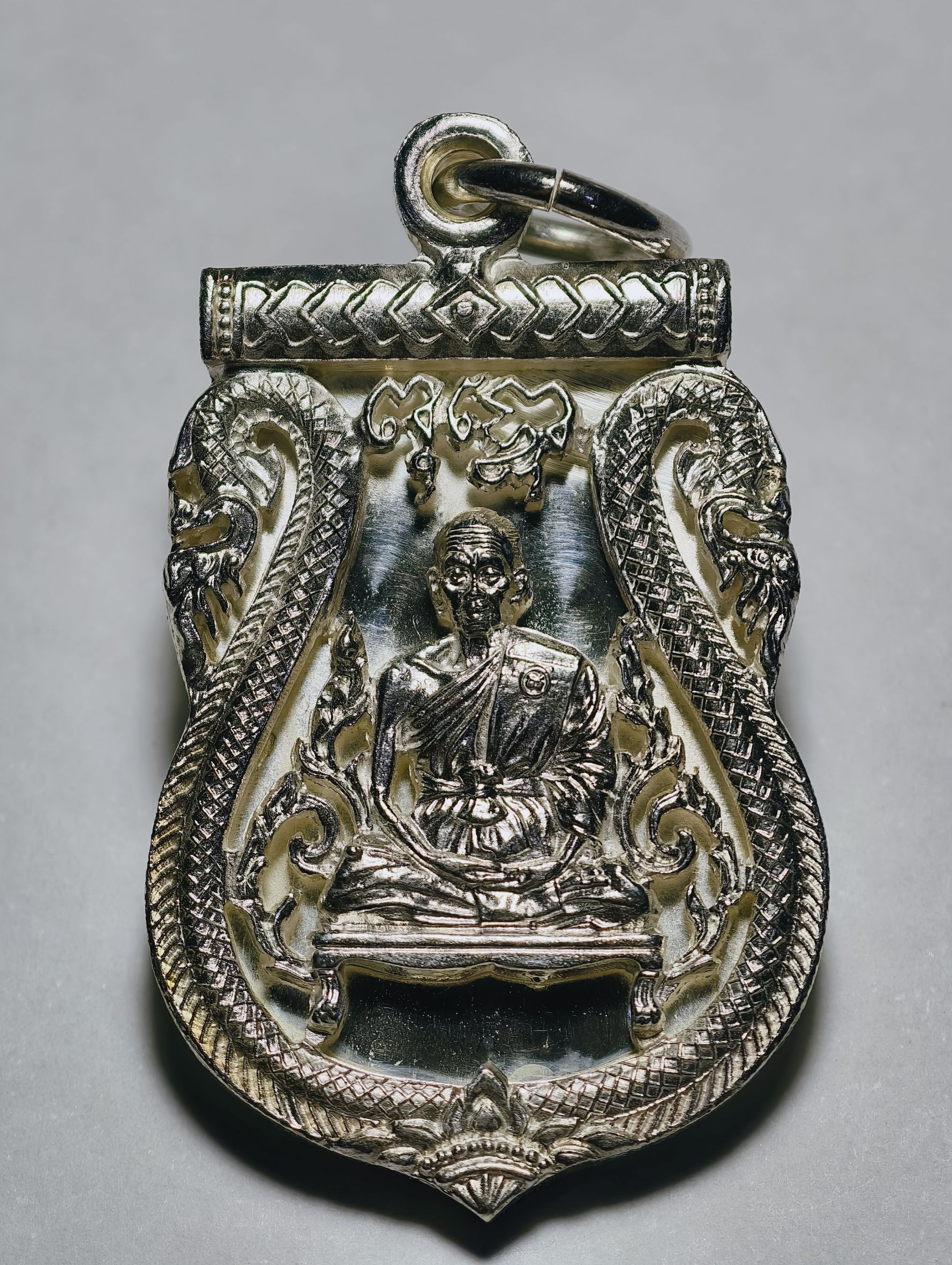 หลวงพ่อคูณ วัดบ้านไร่ เหรียญเสมาฉลุ รุ่น พุทธคูณสยาม เนื้อเงิน ปี2554 (AC3205)