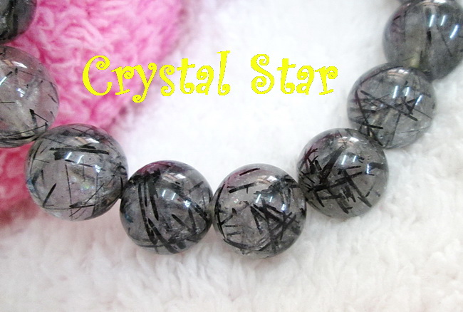 สร้อยข้อมือแก้วขนเหล็ก