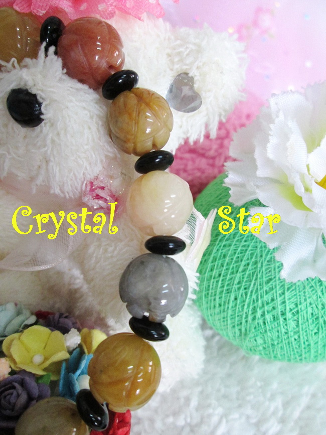 สร้อยข้อมือหยกกลมแกะสลักรูปดอกไม้