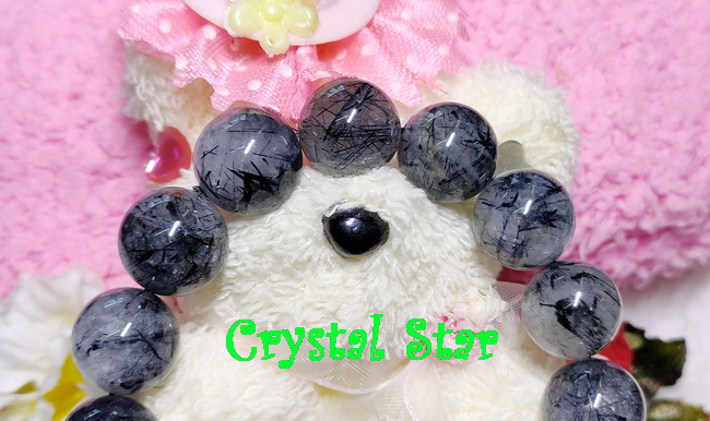 สร้อยข้อมือแก้วขนเหล็ก