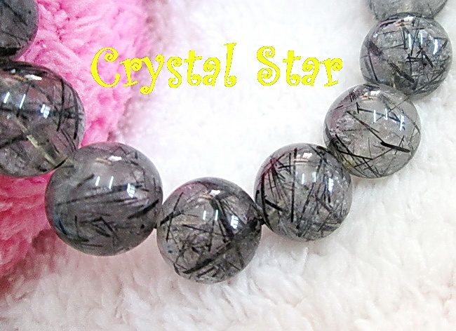 สร้อยข้อมือแก้วขนเหล็ก