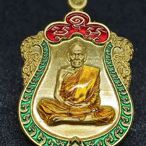 หลวงพ่อพัฒน์ วัดห้วยด้วน เหรียญมหาเศรษฐี 99 เนื้อทองทิพย์ ลงยาจีวร (ป๋อง สุพรรณ) การันตี (AC899)