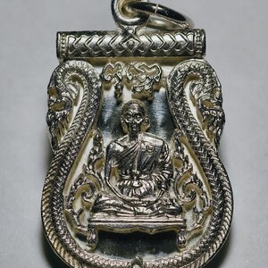 หลวงพ่อคูณ วัดบ้านไร่ เหรียญเสมาฉลุ รุ่น พุทธคูณสยาม เนื้อเงิน ปี2554 (AC3205)