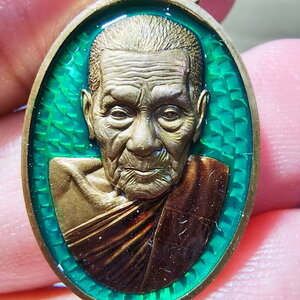 หลวงปู่อิ่ม วัดทุ่งนาใหม่ นครศรีธรรมราช เหรียญเล็กหน้าใหญ่ รุ่นแรก (AB5872)