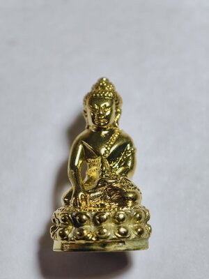 หลวงพ่อคูณ วัดบ้านไร่ พระกริ่งหลวงพ่อคูณ รุ่น เศรษฐีไพศาล เนื้อทองฝาบาตร ปี 2557 KA2731