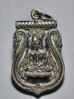 หลวงพ่อคูณ วัดบ้านไร่ เหรียญเสมาฉลุ รุ่น พุทธคูณสยาม เนื้อเงิน ปี2554 (AC3205)